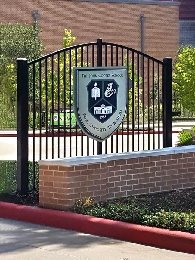 The John Cooper School: Exterior Campus Gateway Feature CGF - Center Wall CW - School Crest SC
