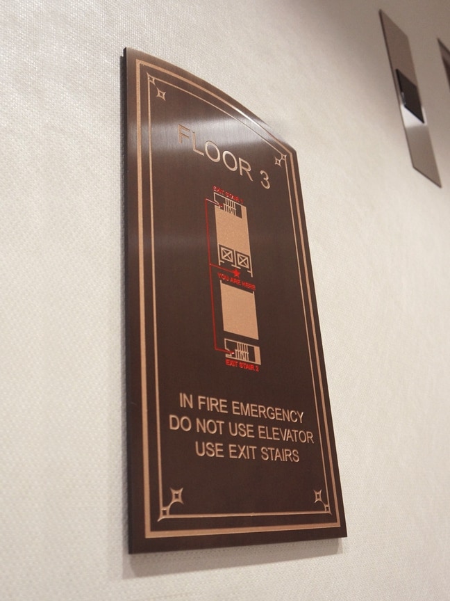 Sundance Square Commerce Building: Interior Elevator Code Plaque ECP