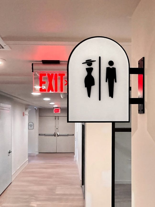 Inscription West Palm Beach: Interior Projecting Flag Sign PFS (Restrooms)